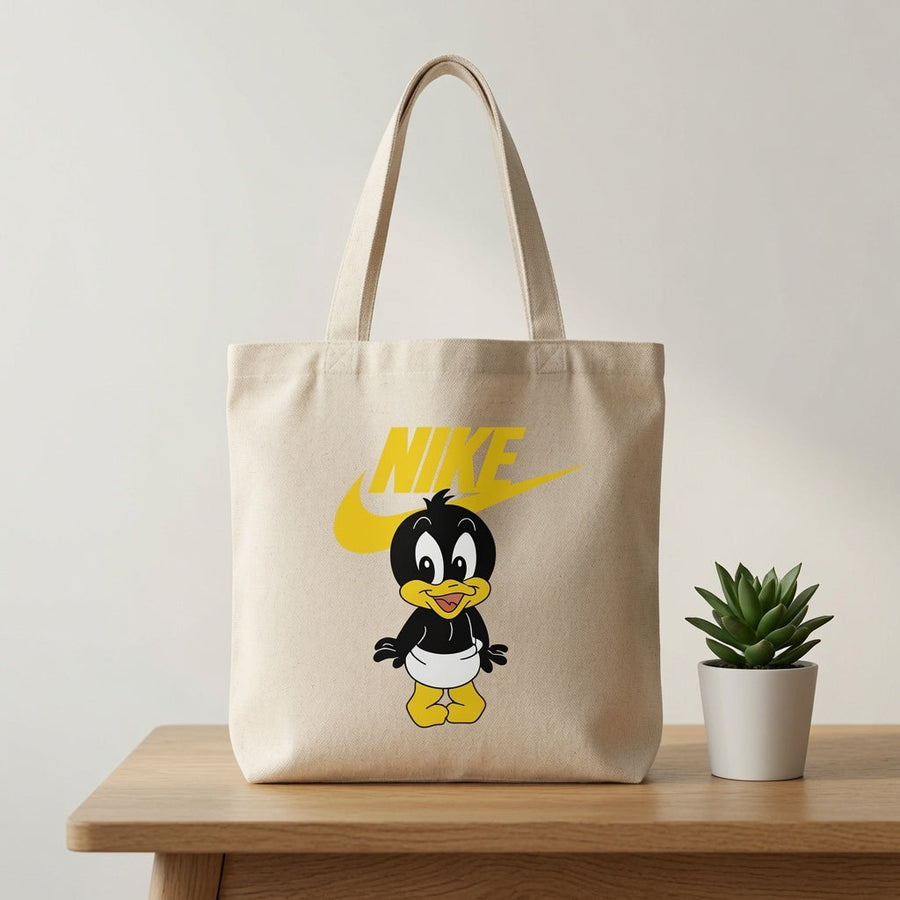 Cute Baby Daffy Duck Yellow Nike Swoosh Cotton Canvas Tote Bag