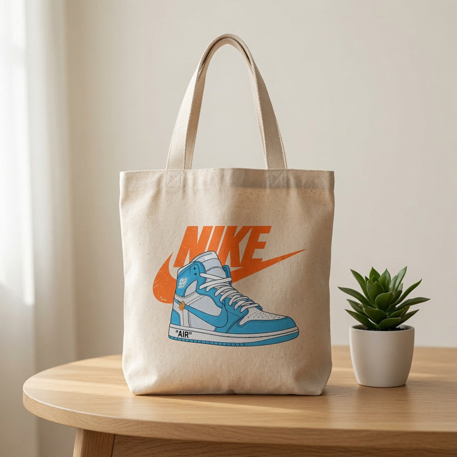 UNC Light Blue High-Top Graphic Canvas Tote Bag - Vintage Orange Logo Streetwear Shoulder Bag