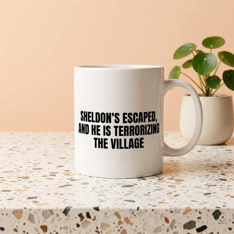 Sheldon's Escaped And He Is Terrorizing The Village Funny Ceramic Coffee Mug - Hilarious Sarcastic Quote Drinkware Cup (11oz)